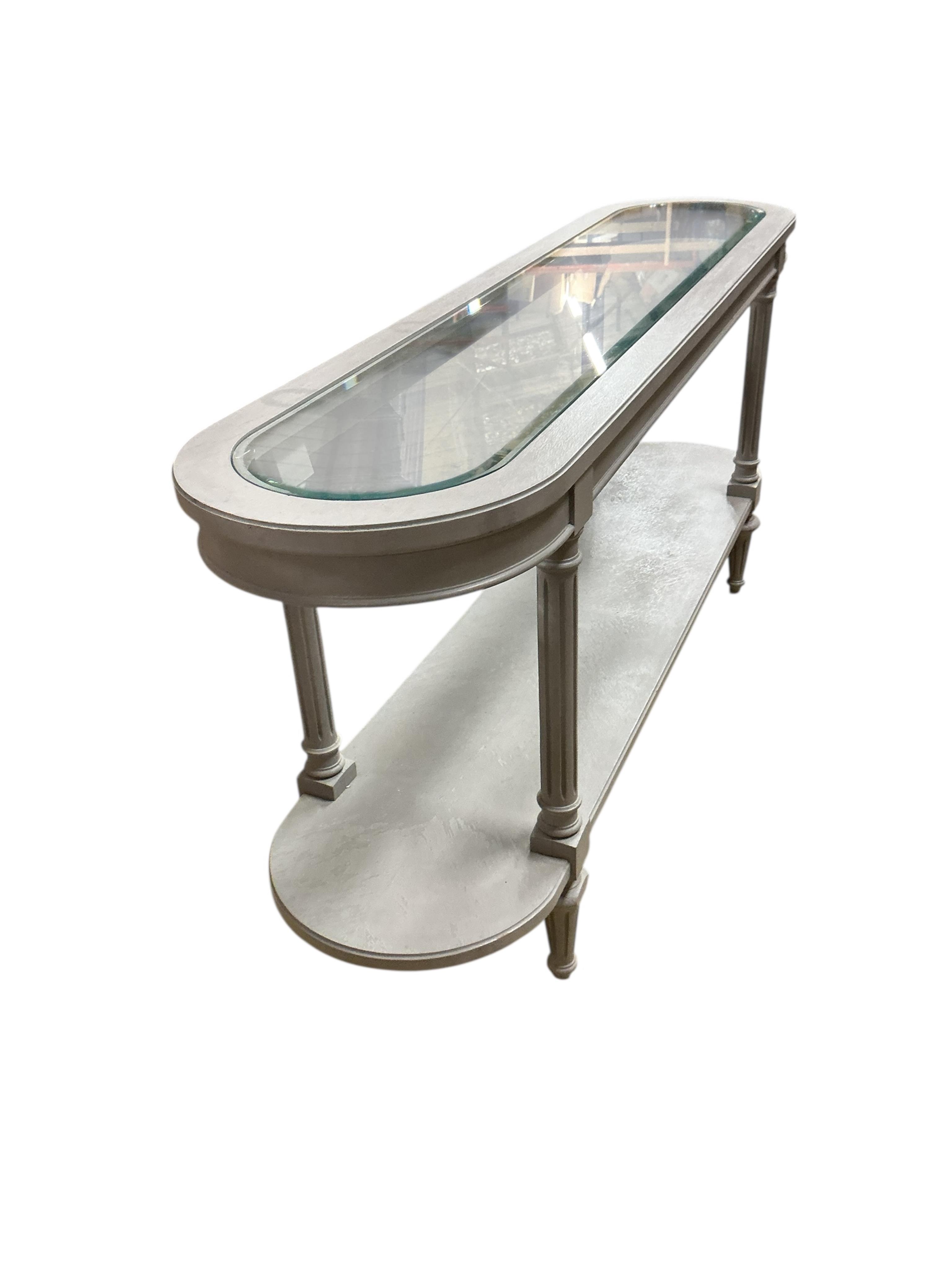 A painted two tier glass top console table, width 146cm, depth 35cm, height 67cm